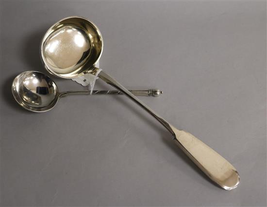 A late 19th century Russian 84 zolotnik silver fiddle pattern soup ladle, 1889 and a Russian silver and niello sauce ladle.